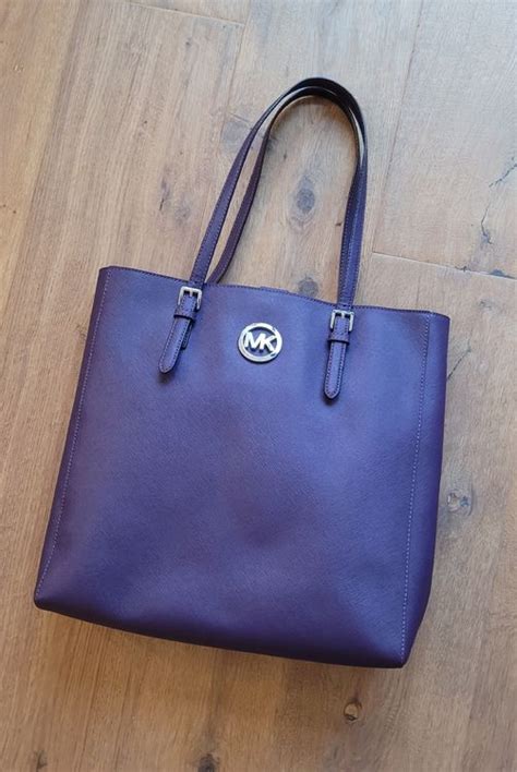 michael kors tasche violett bommel|Michael Kors clothing.